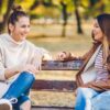 women_talking_in_park